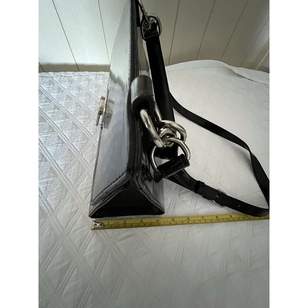 Steve Madden bag, sizes 10 × 8 with adjustable‎ strap,,black